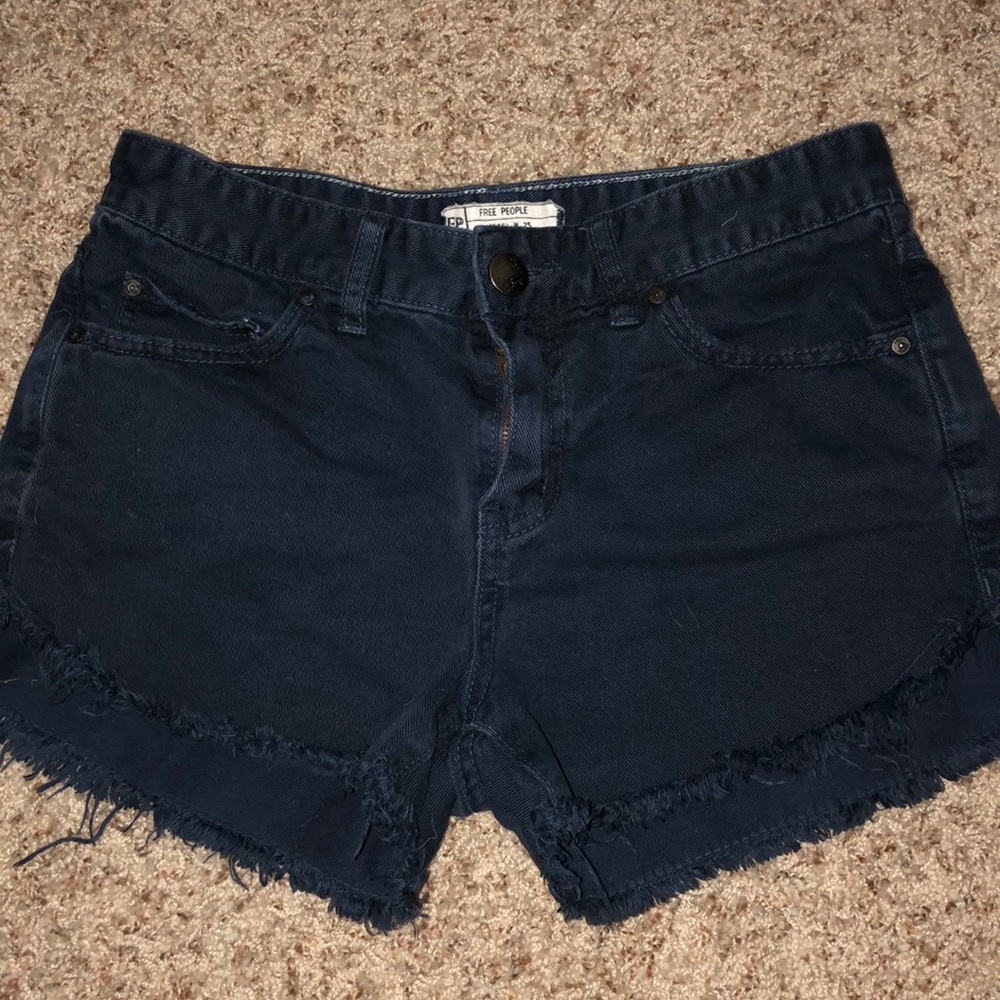 Free people dolphin hem denim shorts